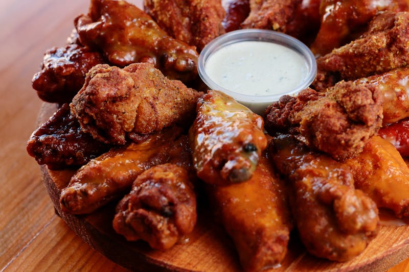 Classic Buffalo wings with blue cheese dipping sauce