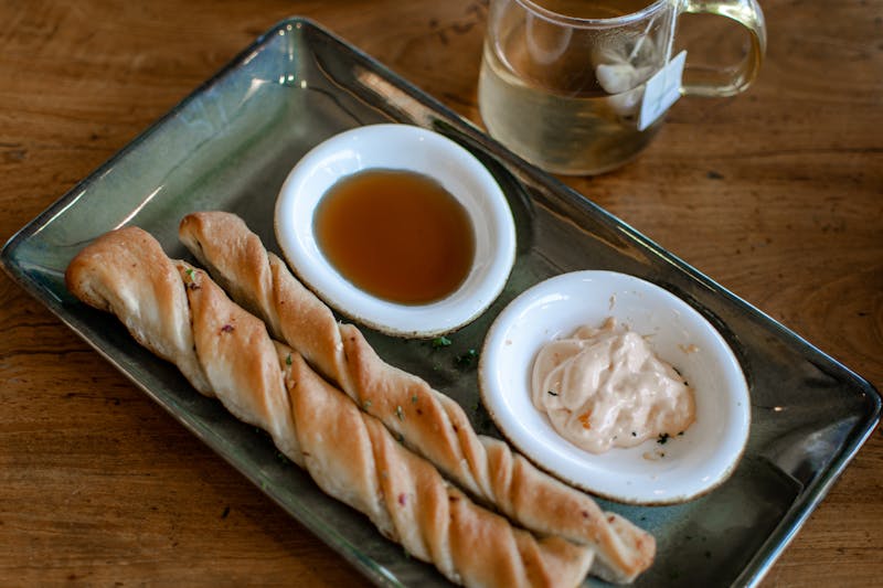 Breadsticks with garlic butter and marinara dipping sauce